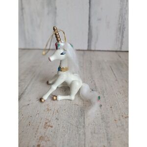 Vintage Kurt Adler unicorn sitting wooden ornament Xmas flower figure